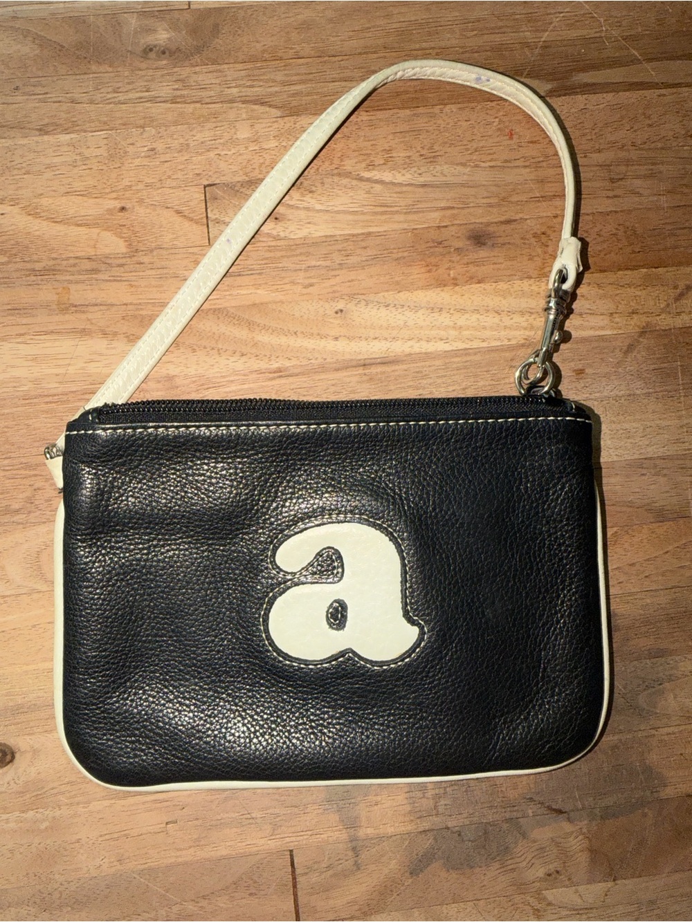 Wilson’s Leather ‘a’ Monogram Wristlet